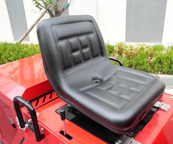 The ergonomic operator seat of the DBL-T490 sit-on track loader, designed for all-day comfort
