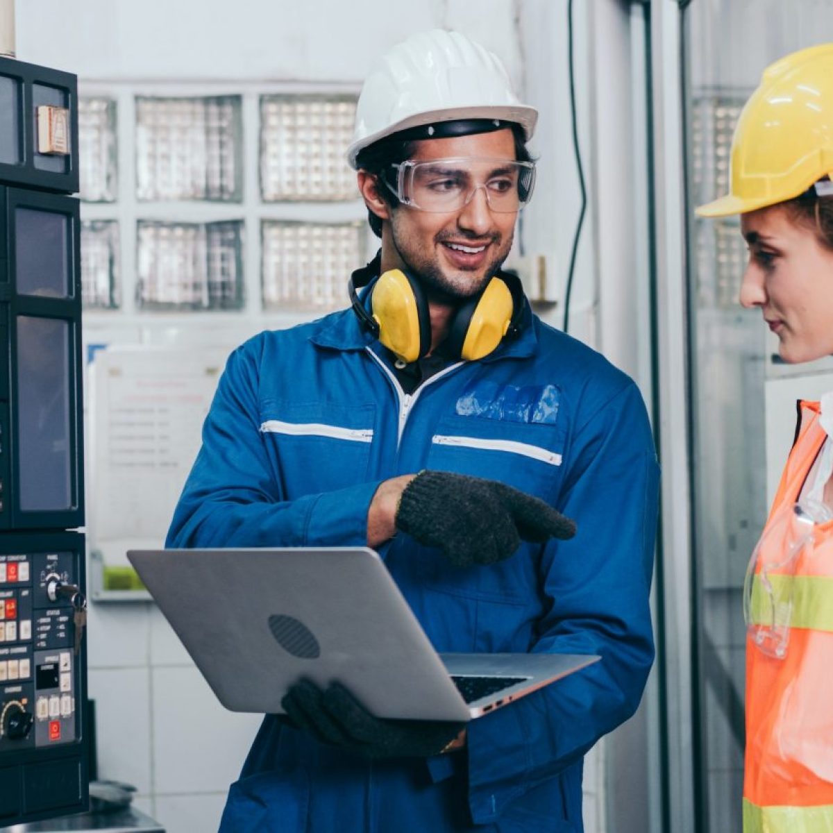 male-industrial-engineer-with-female-assistant-using-laptop-control-machine.jpg male-industrial-engineer-with-female-assistant-using-laptop-control-machine.jpg